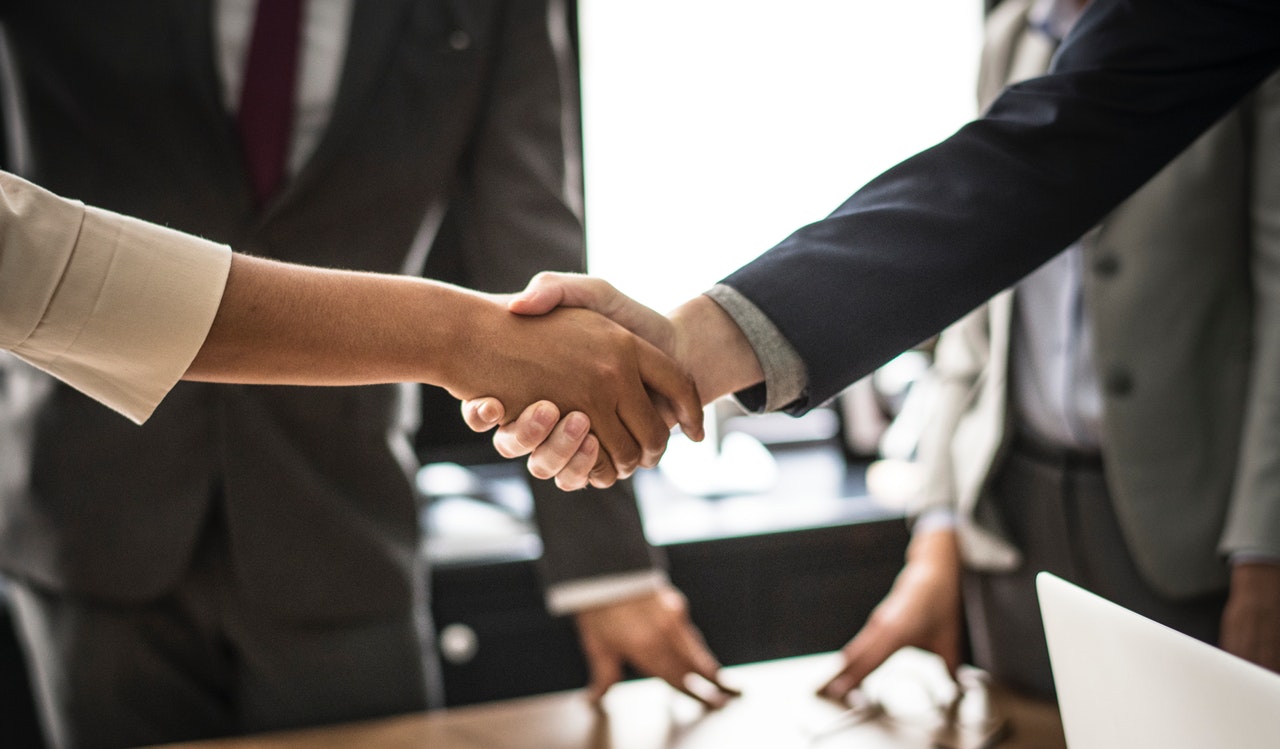 Two people shaking hands